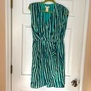 Beautiful blues and greens in this faux wrap dress